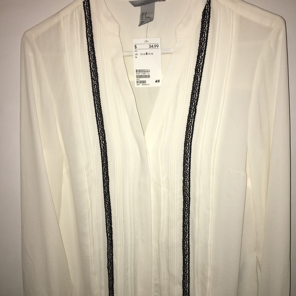 Cream blouse with pretty details